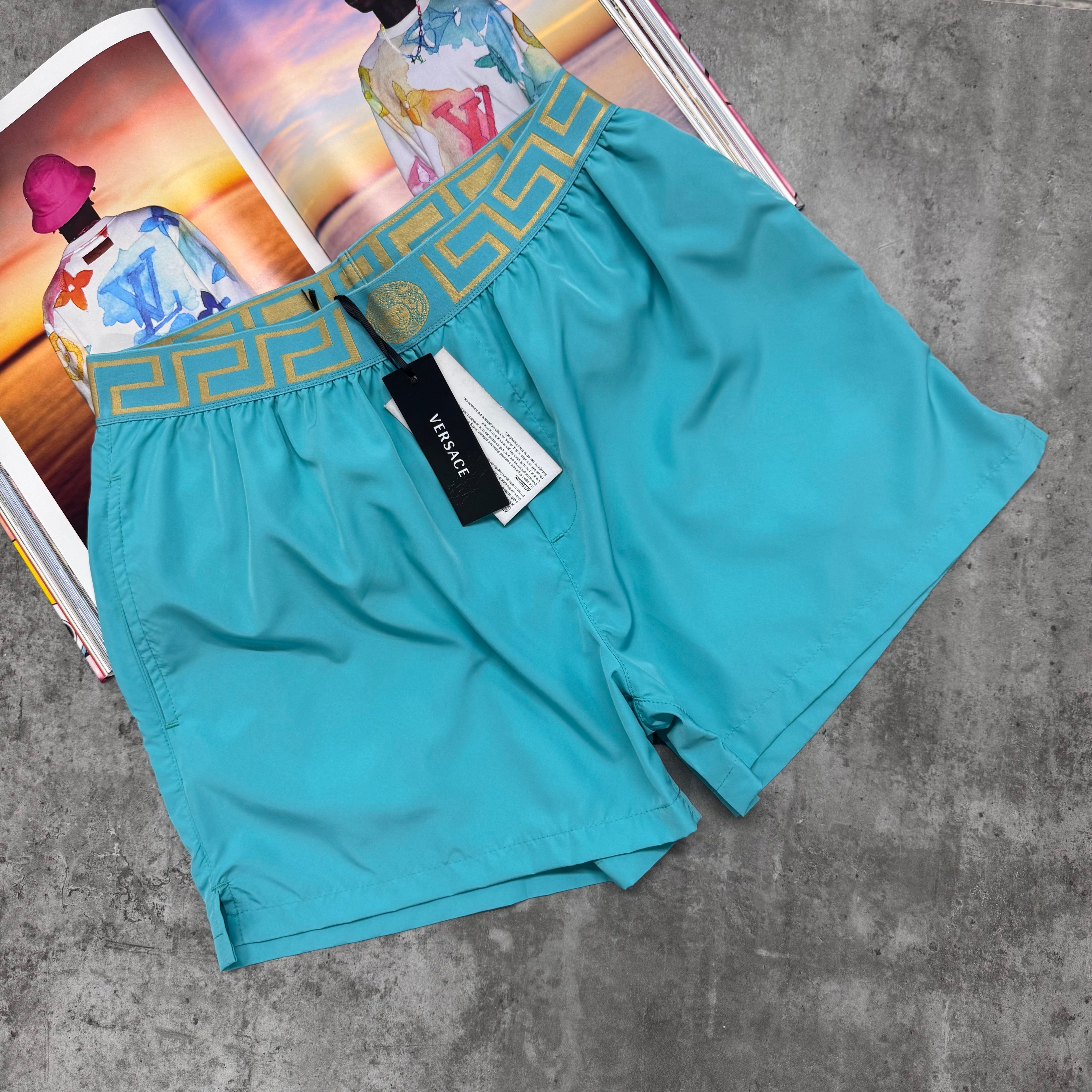 VER SWIM SHORTS - CYAN