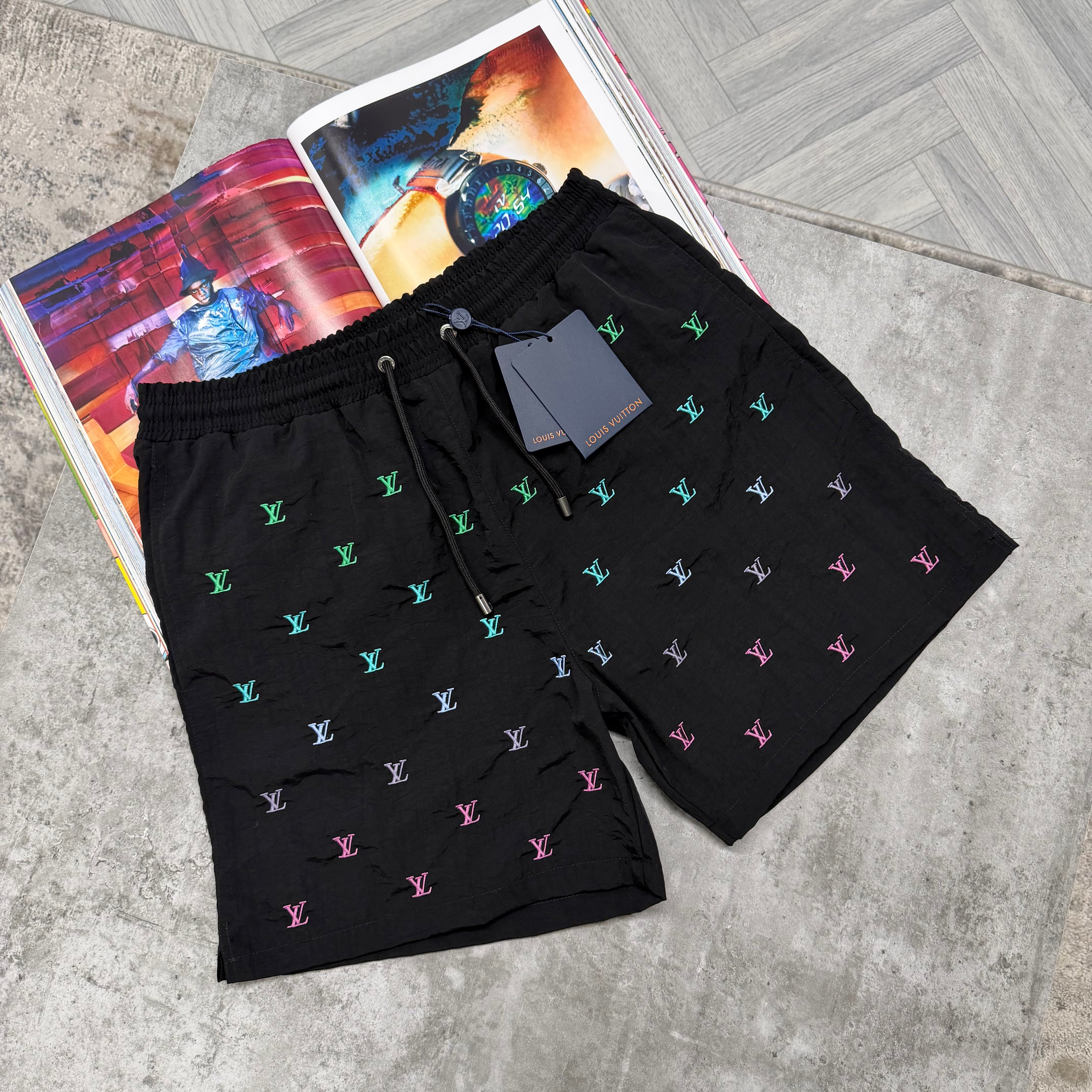 LVE MONOGRAM SWIM SHORTS - BLACK
