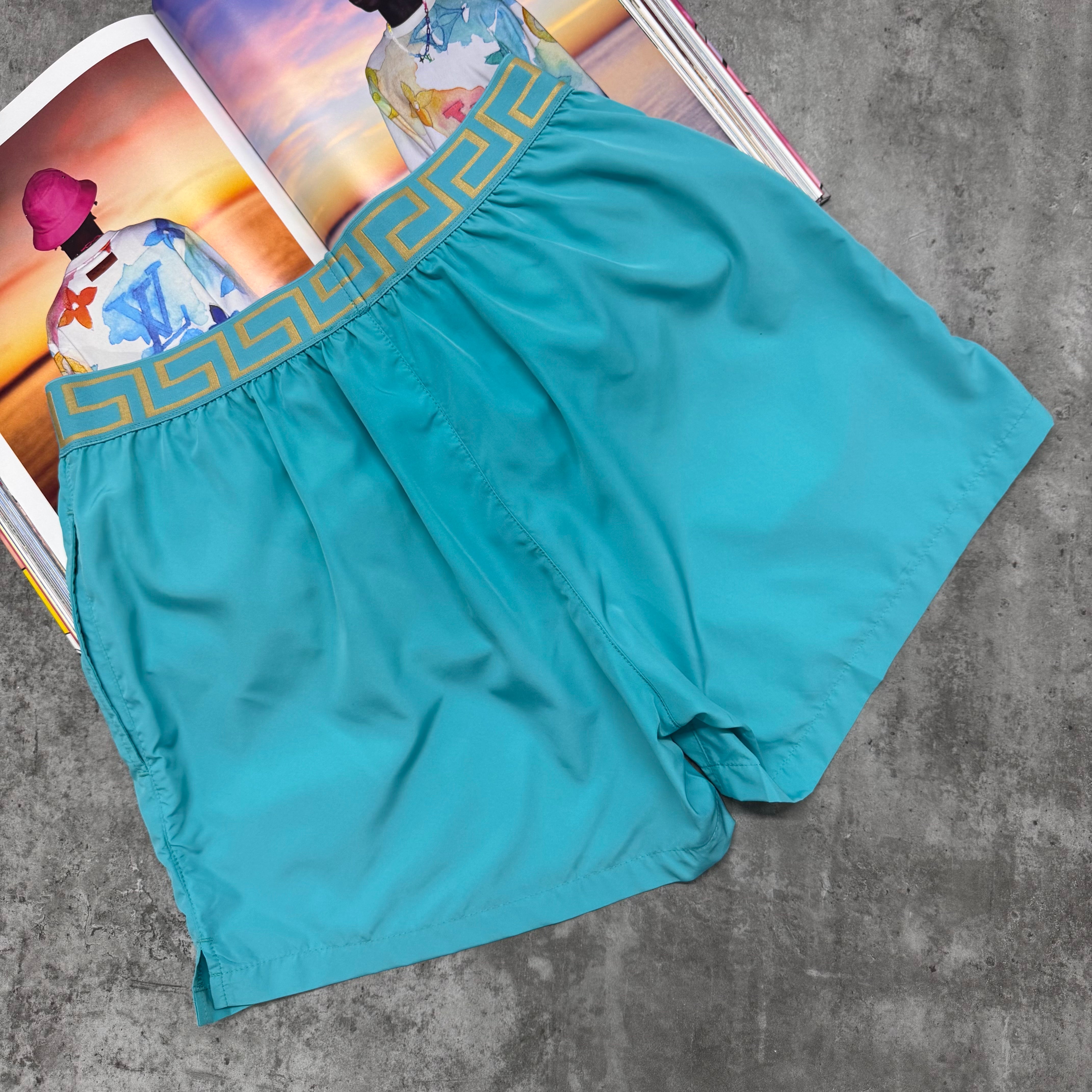 VER SWIM SHORTS - CYAN