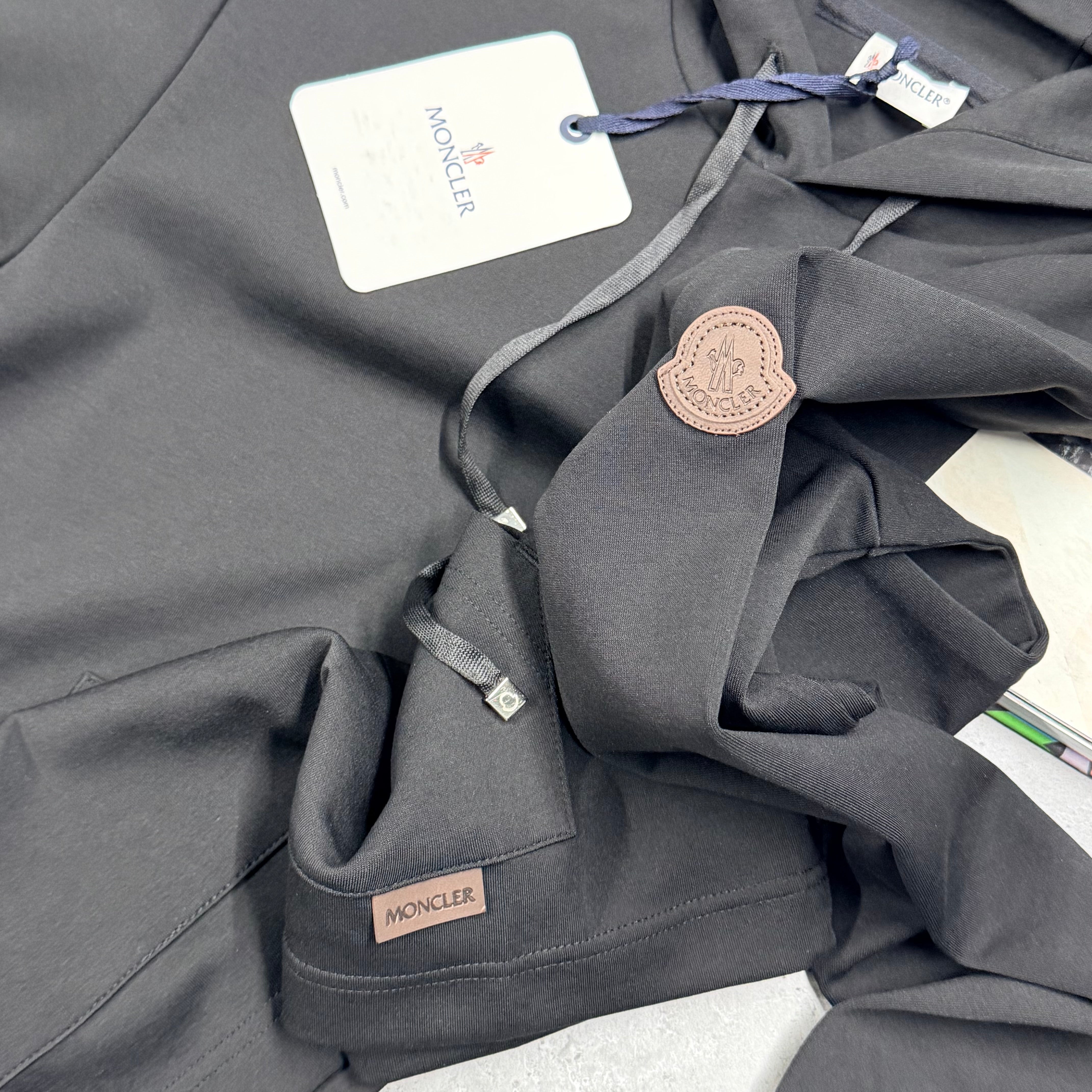 MNCLR LEATHER LOGO HOODIE - BLACK